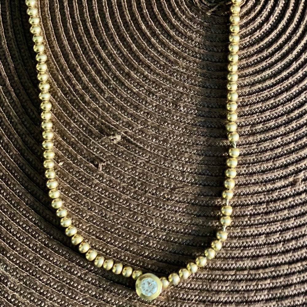 Faux gold ball and diamond necklace